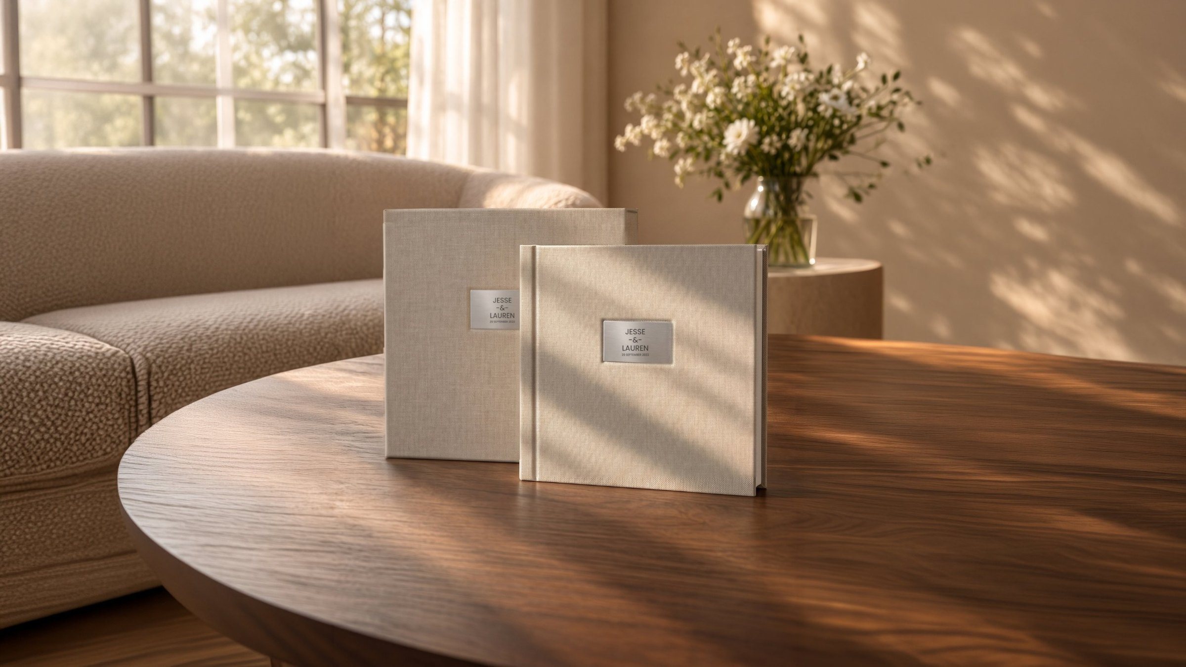 The Heirloom Album by Vadim and Irina Pastuh, two linen albums on a wooden table