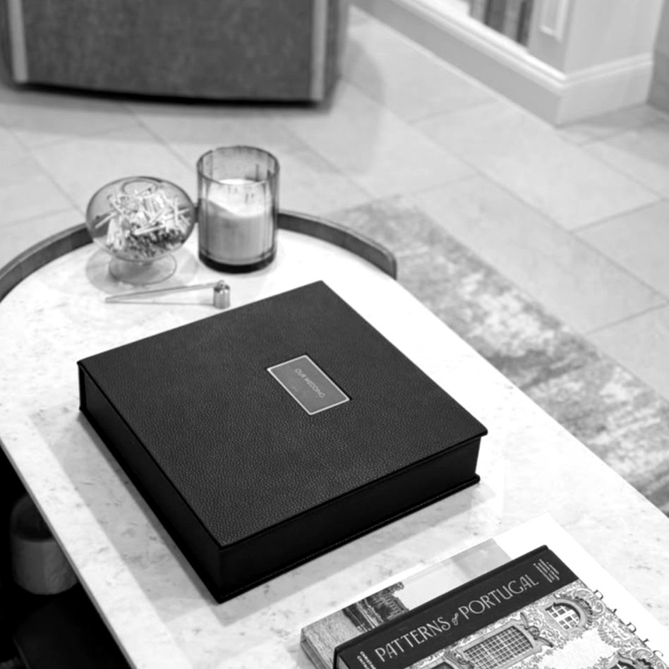 Vicky and Sam's album in its keepsake box on their coffee table